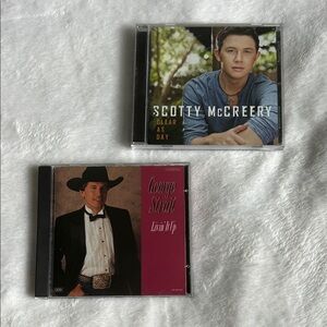 George Strait & Scotty McCreery Cd’s